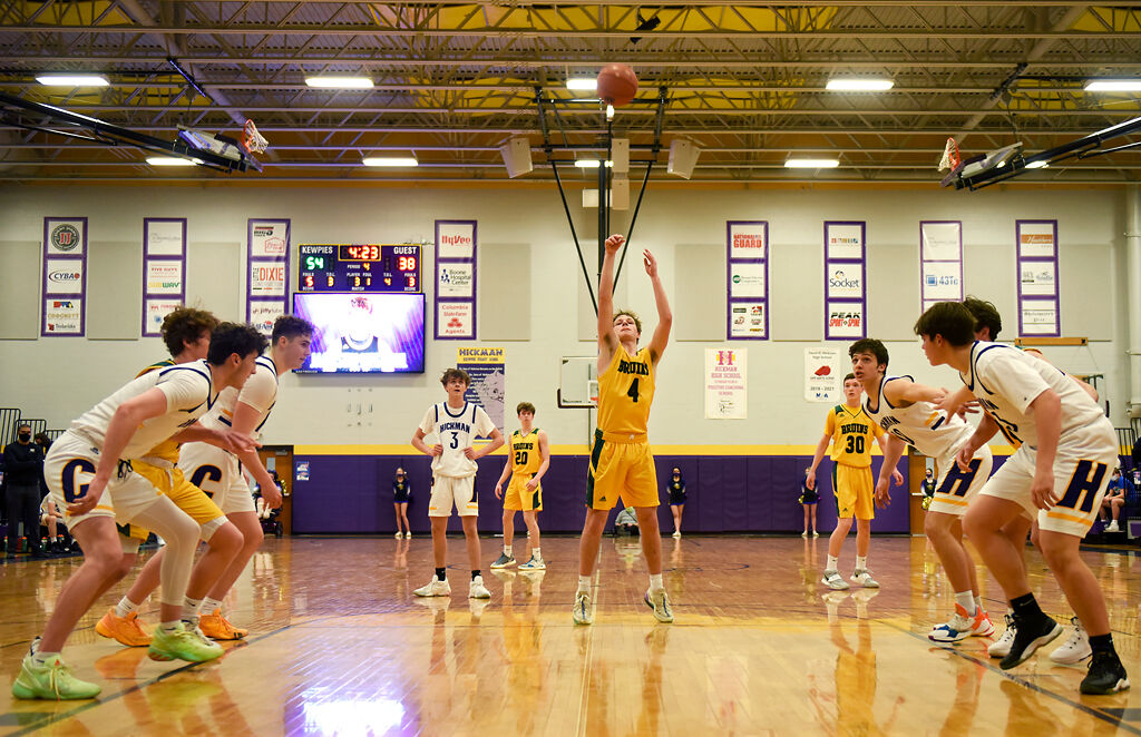 Rock Bridge junior Nate Norris aims for the net